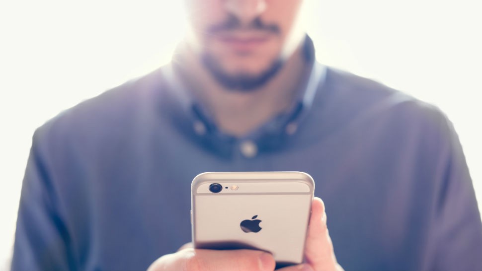 Man using Apple iPhone
