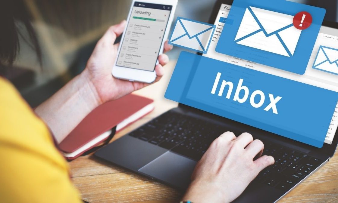 woman on a laptop checking email