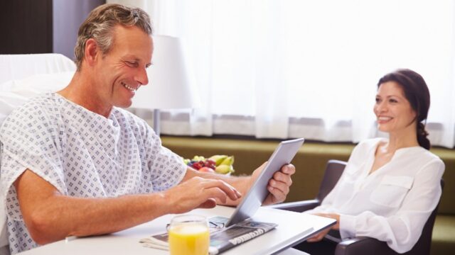 male patient using tablet